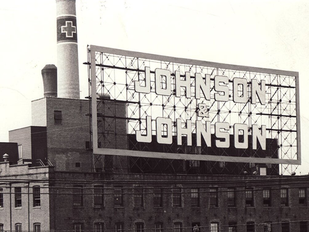 A historic Johnson & Johnson rooftop sign.