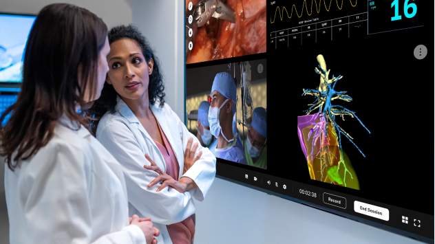 Two female surgeons using AI for an advanced medical procedure
