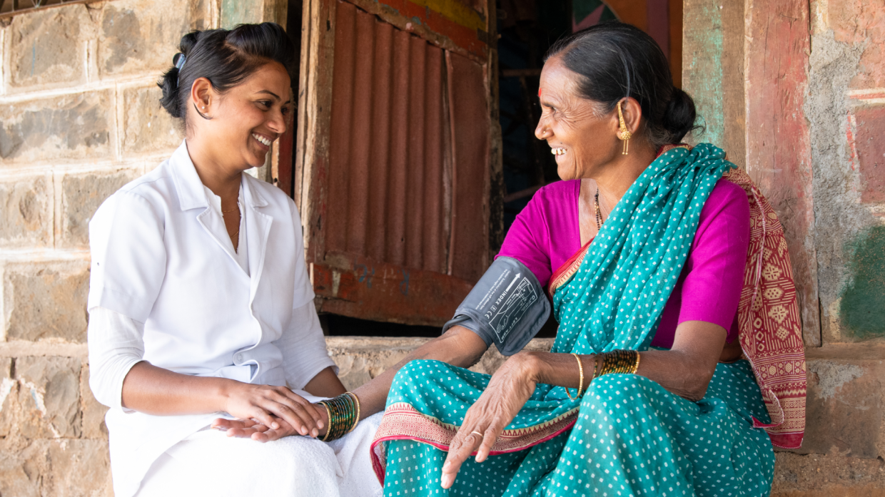 A nurse caring for an Indian patient