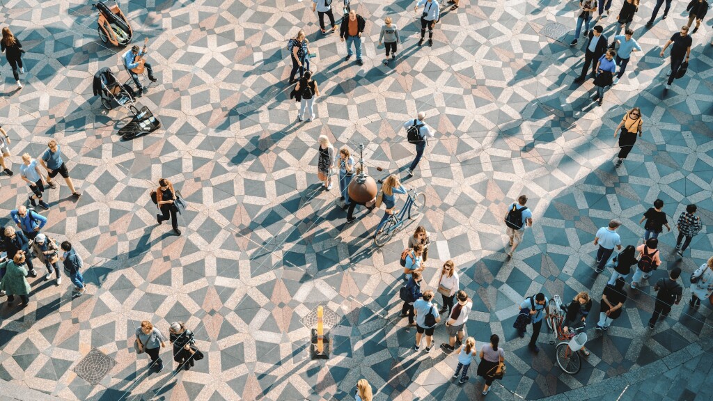 jj-photo-aerial-view-of-people-walking-in-city-square-gettyimages-1156746973-4star.jpg