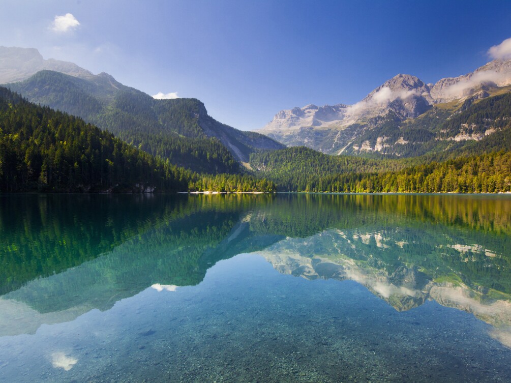 A landscape of a lake and mountains