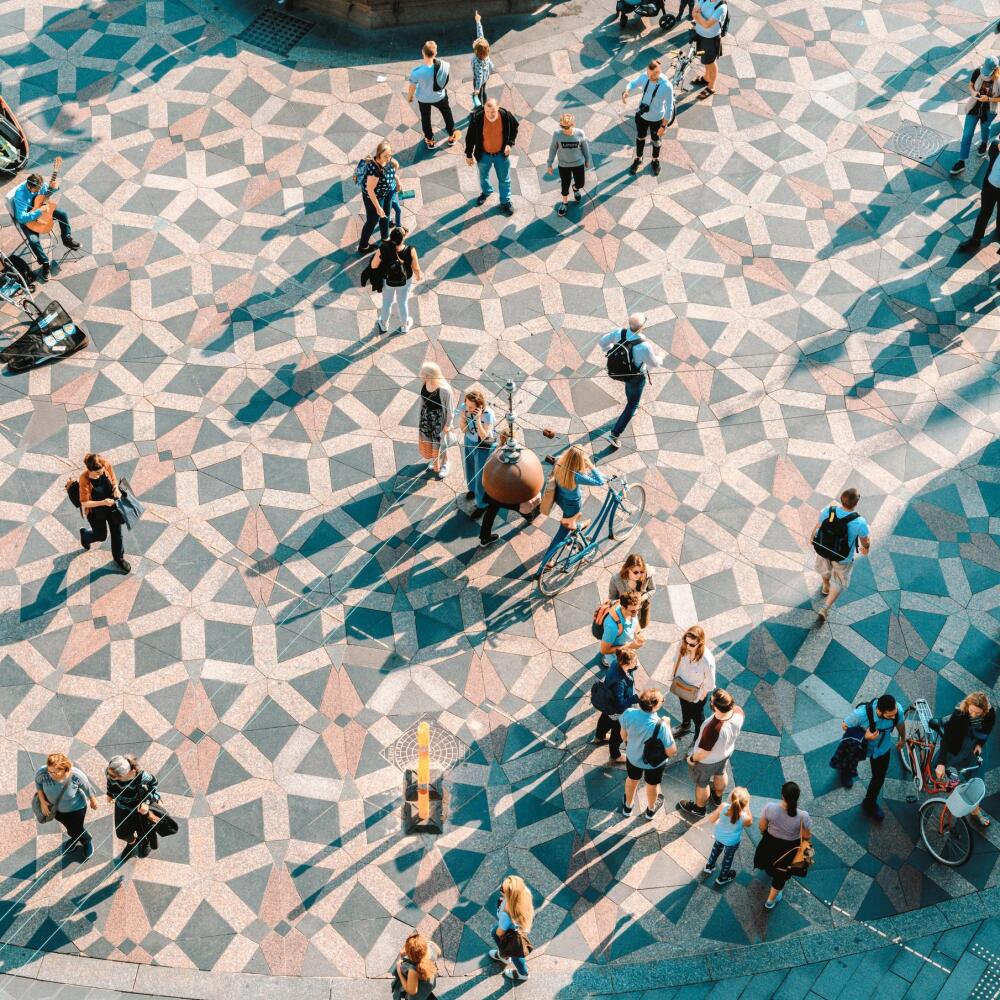 jj-photo-aerial-view-of-people-walking-in-city-square-gettyimages-1156746973-4star-12-26-48-pm.jpg
