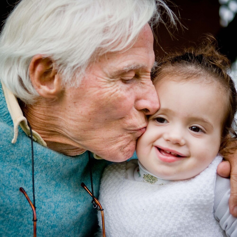 jj-photo-grandfather-kissing-baby-gettyimages-1144792597-1star.jpg