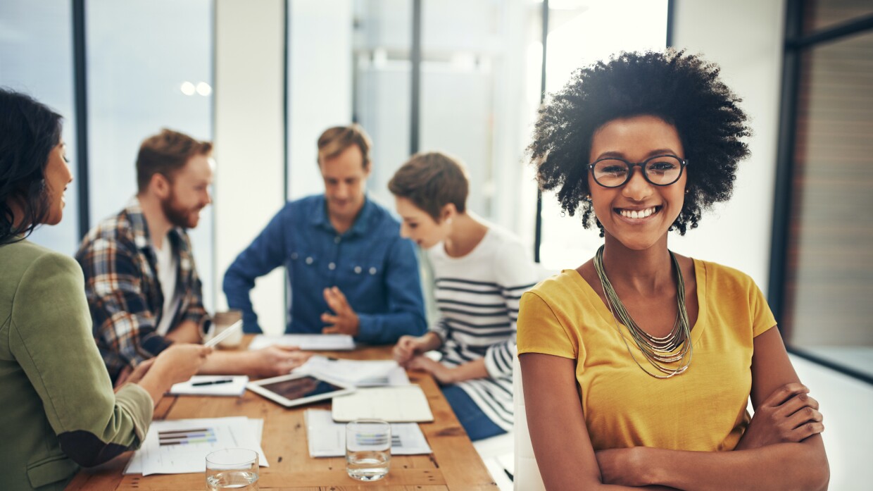 Portrait of an attractive young businesswoman sitting in the boardroom during a meeting