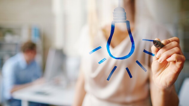 lightbulb drawing on a glass pane