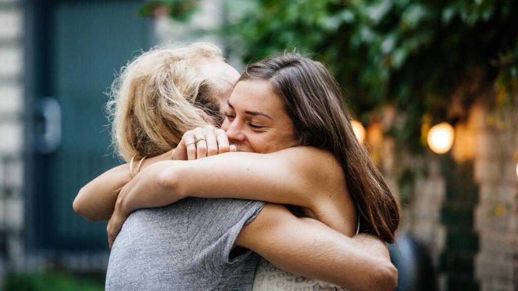 jj-photo-women-hugging-gettyimages-825250080-3star.jpg