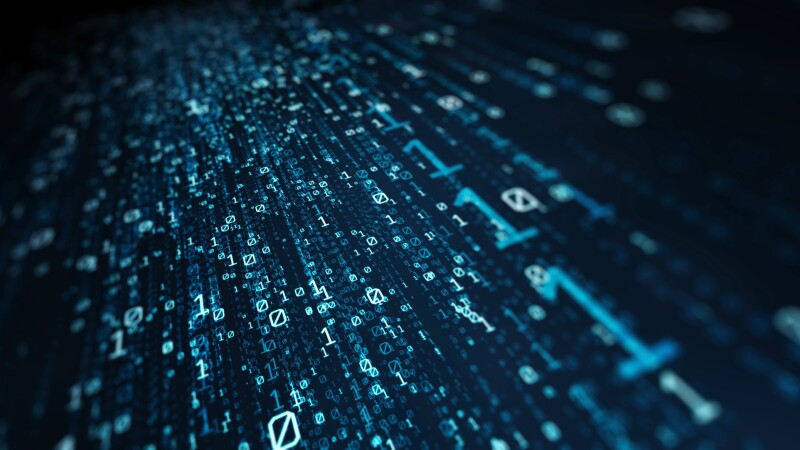 Blue and white binary code flowing in a stream of code