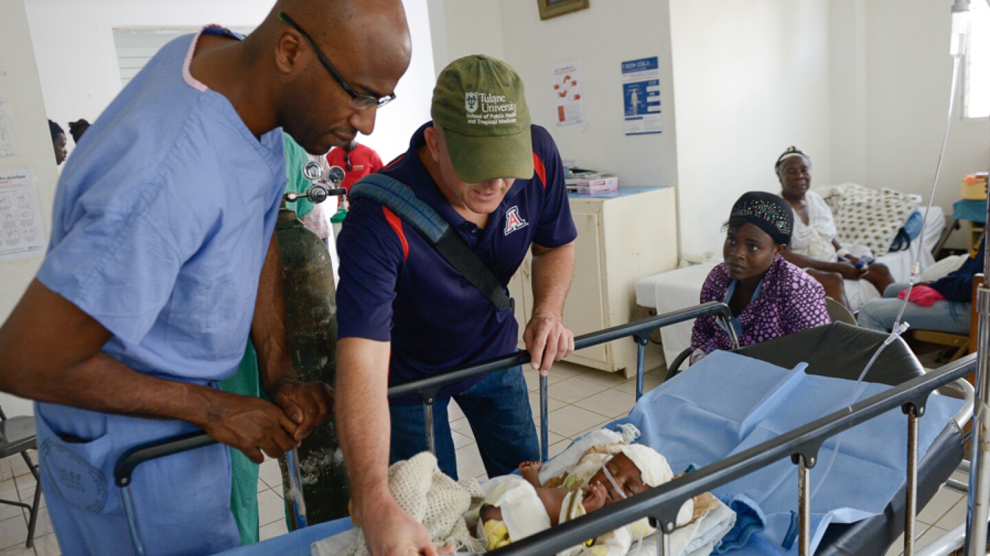 Pierre Theodore, M.D., volunteering at a hospital in Haiti