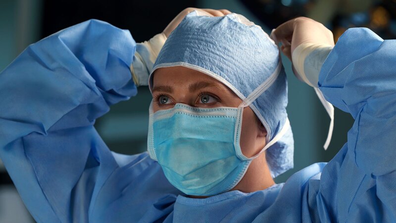 Surgeon in the OR preparing for surgery