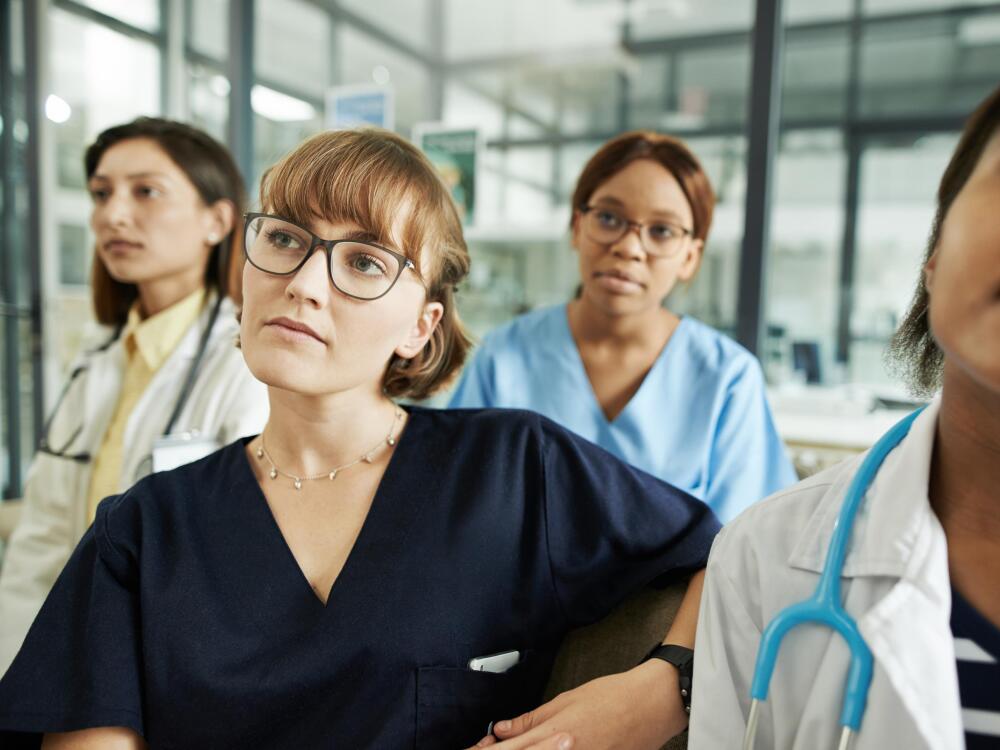 HCPs listening to presenter